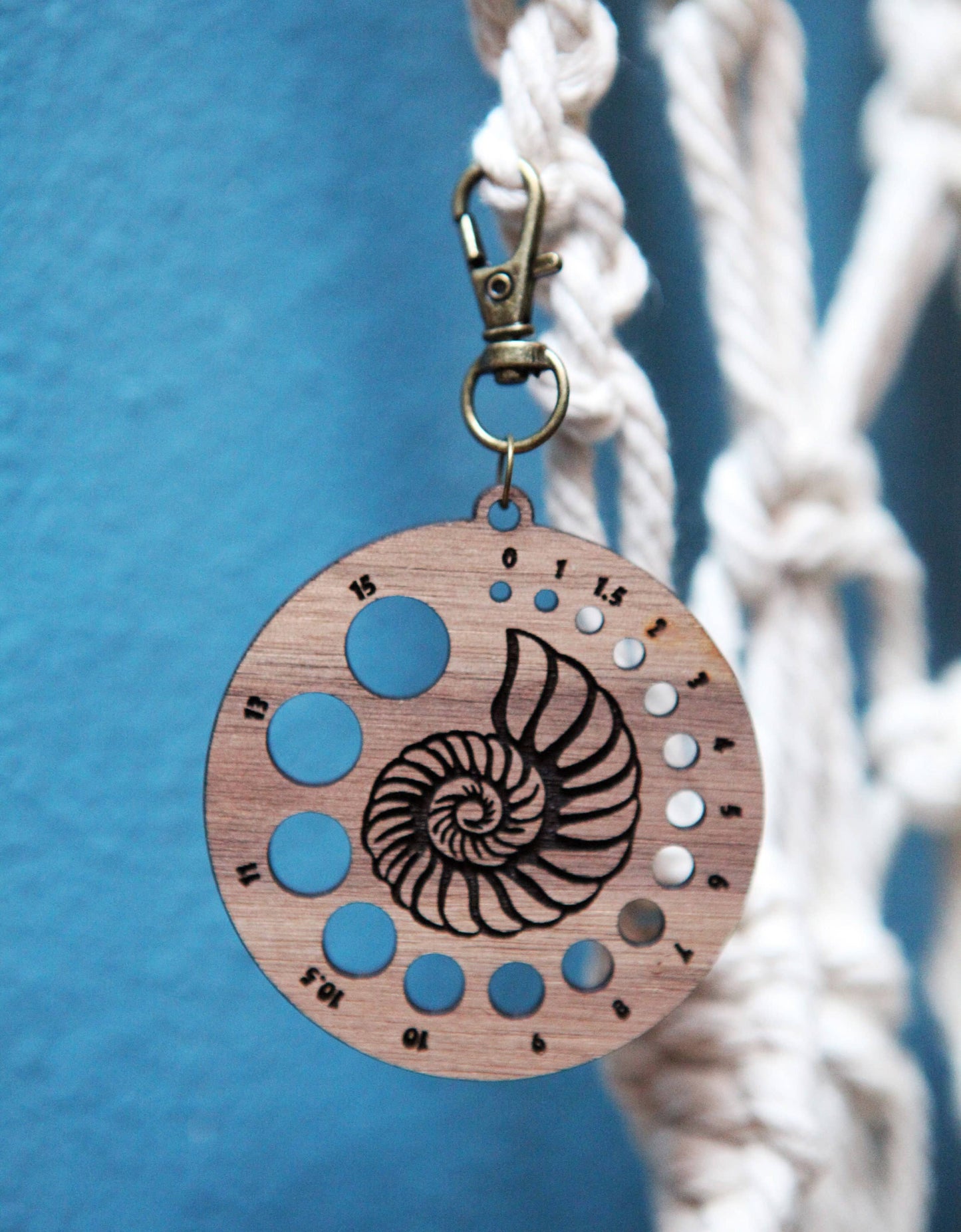Walnut Nautilus Knitting Needle Gauge & Bronze Clasp