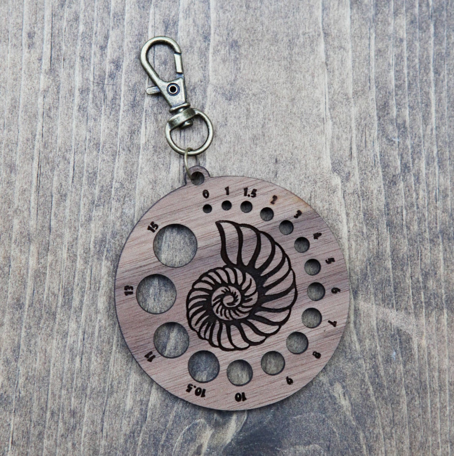 Walnut Nautilus Knitting Needle Gauge & Bronze Clasp